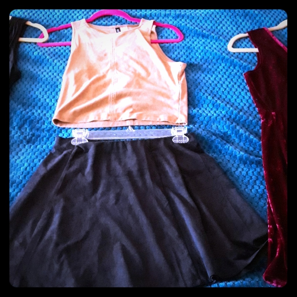 Two dresses, a crop top and highwaisted skirt.